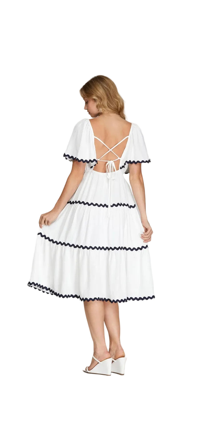 White navy trim ruffle midi dress back view